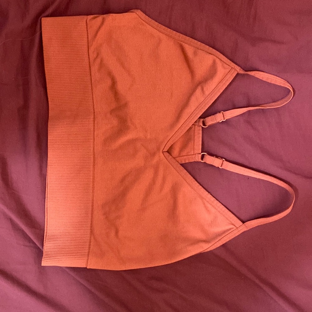 I am selling a bra it is a size medium and it is made with cotton and from pink